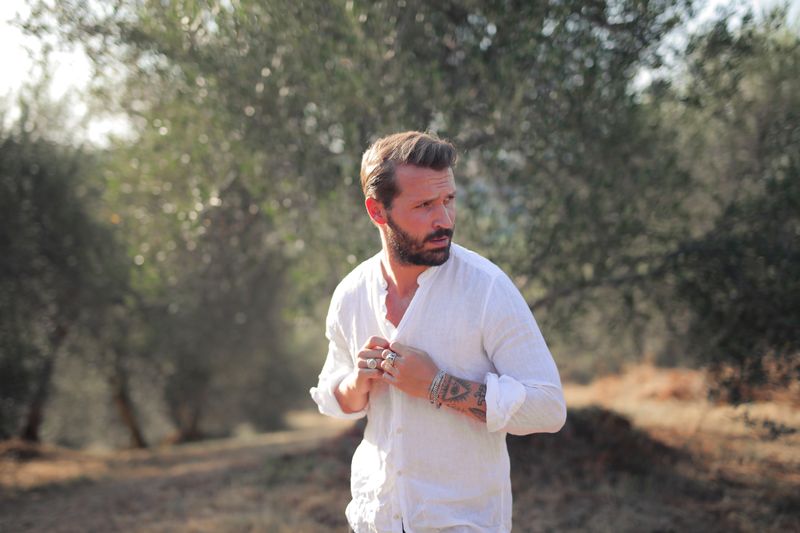 Man in a light linen shirt