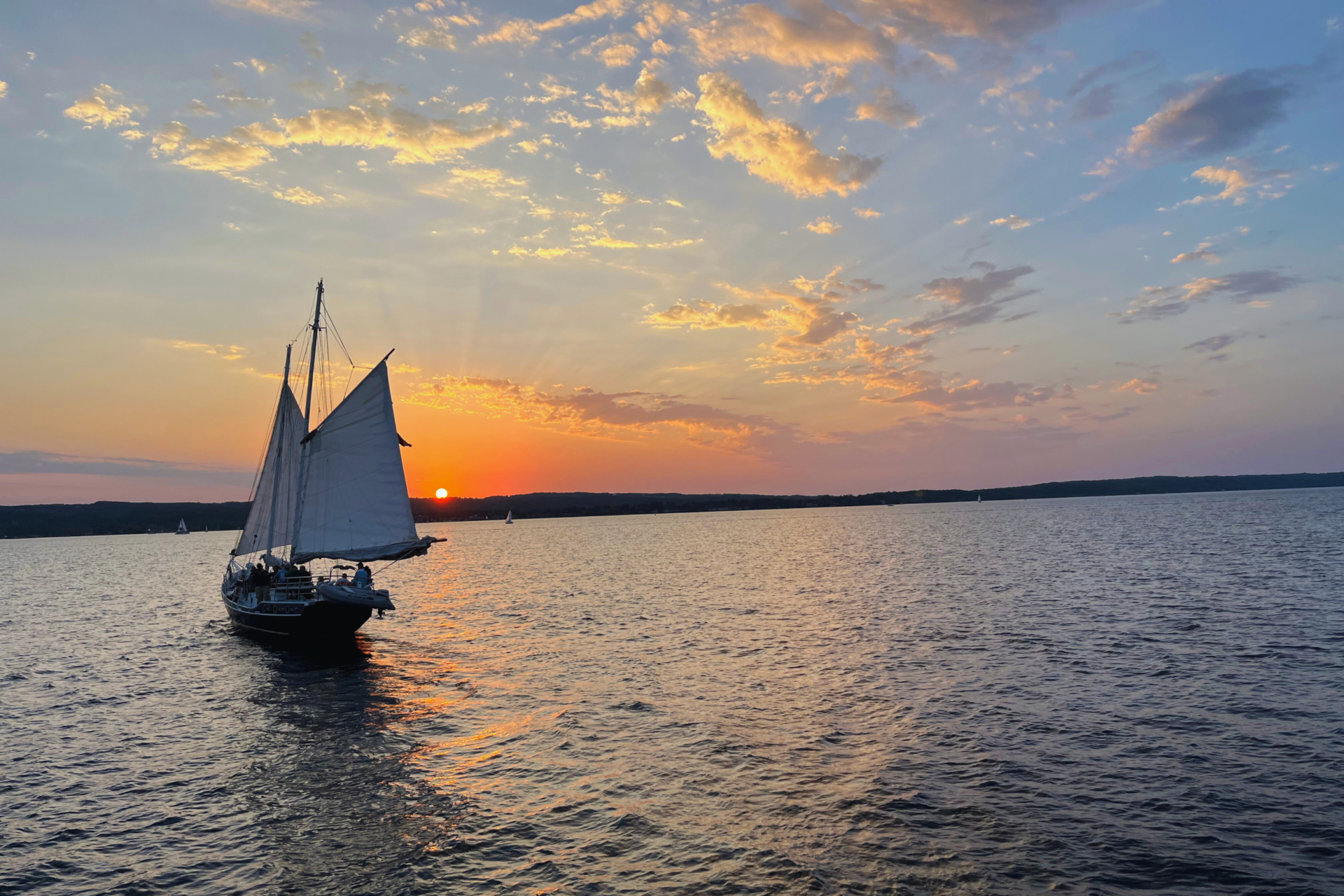 Sailboat at sunset during weekend in Traverse City. 