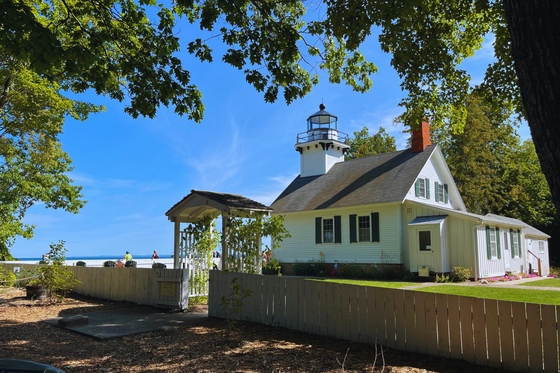 Mission Point Lighthouse with blue skies. 